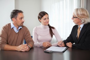 Couple in meeting with a financial planner